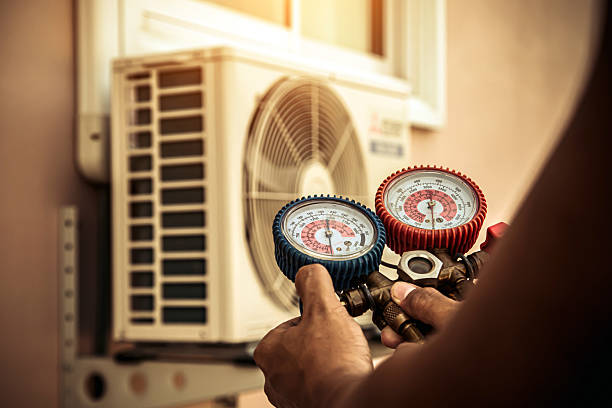 Professional Heat Pump Repair technician working in Davison, MI